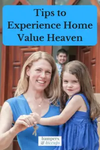 Tips to Experience Home Value Heaven family handing keys to new owner of their house for sale hampersandhiccups