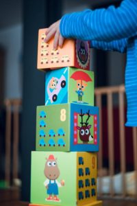 Perfect playroom child stacking building blocks