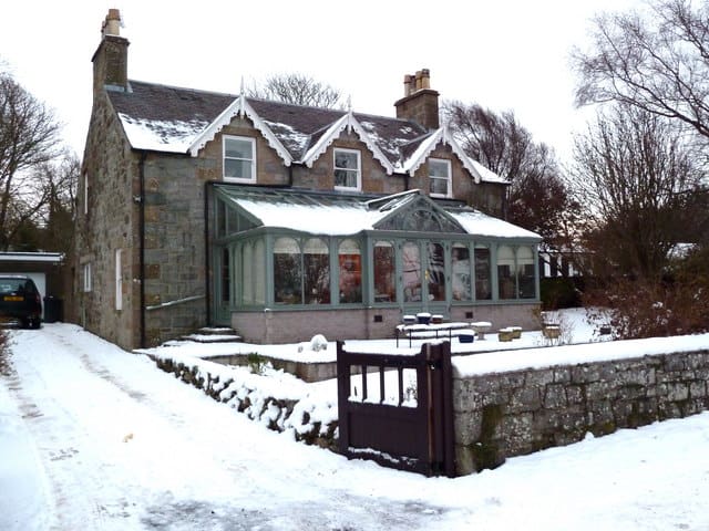 Creating A Cozy Living Space For Winter #Cozy #Hygge #WinterPrep #WinterDecor #HomeDecor #Hampers&Hiccups Cozy Living Space For Winter house with snow around it