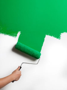 Home improvements more affordable painting a wall green with a paint roller hampersandhiccups