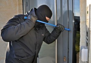 Protecting Your Home from a burglar wearing a black mask 