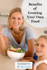 Benefits of Growing Your Own Food mother and daughter sharing a salad grown from their garden hampersandhiccups
