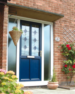 Upgrade your front door blue door with windows on a brick home