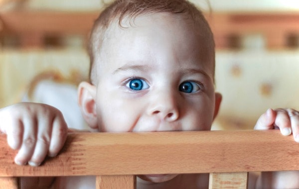 baby-plays-wooden-toy