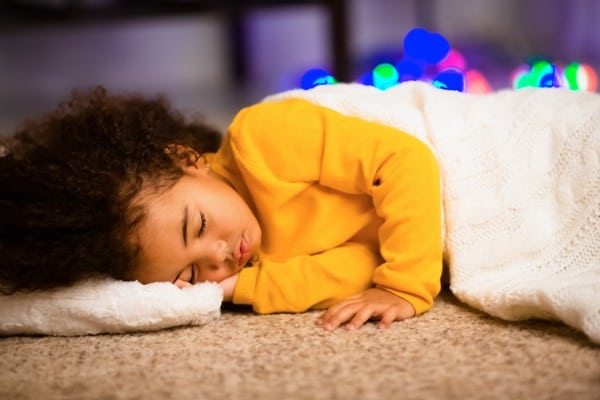 child-sleeping-on-floor