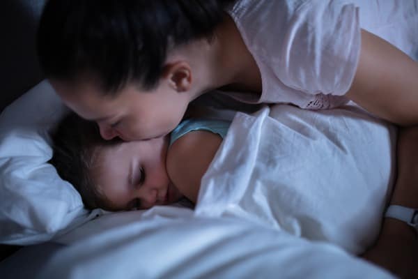 kissing-daughter-good-night