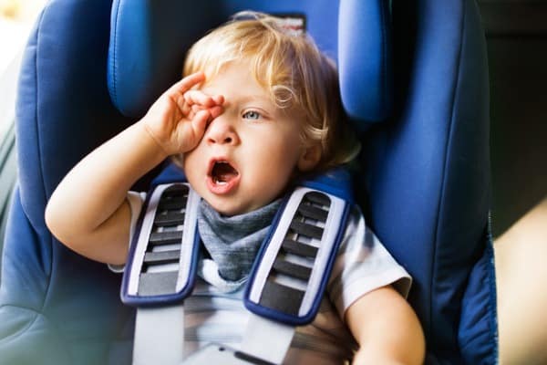 Tired 3 year old yawning