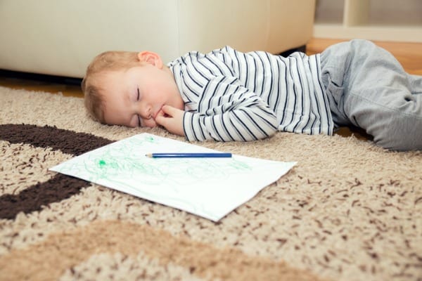 toddler-asleep-on-the-floor