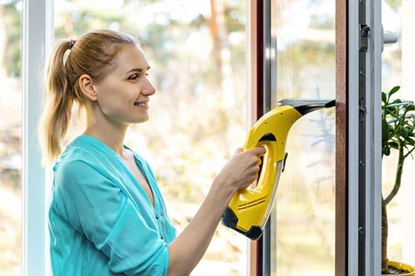 Using window vacuum to clean windows