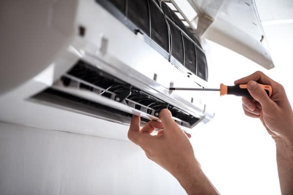 electrician-installing-air-conditioner