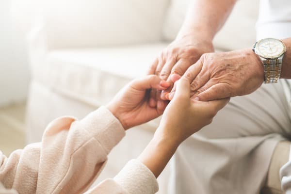 woman-hand-holding-old-senior-elder-hand-with-love-and-care