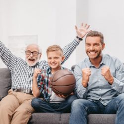 cheering family watching basketball