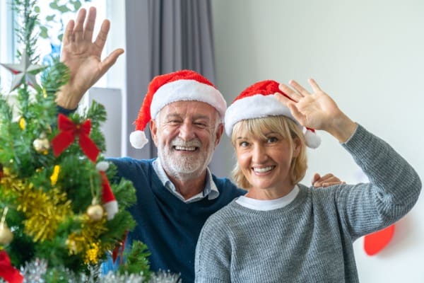family-holidays-christmas-age-and-people-concept-happy-senior-couple