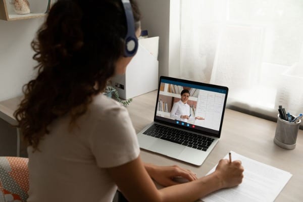 female student study online on laptop at home
