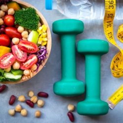 fresh vegetable salad and healthy food for sport equipment for women