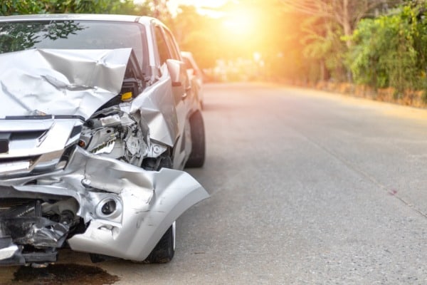 front-of-light-gray-color-car-with-pick-up-have-big-damaged-and