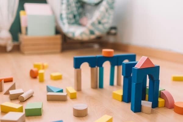 building blocks in the floor of a childrens room