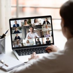 on laptop diverse people collage webcam view over woman shoulder