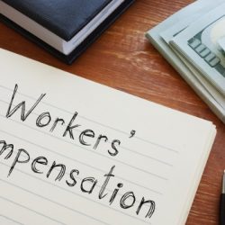 workers compensation is shown on the conceptual business photo