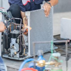 close up of air conditioning repair team use fuel gases and oxygen