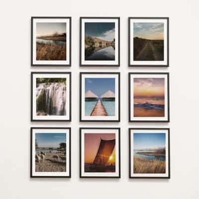 collection of art pieces on the wall