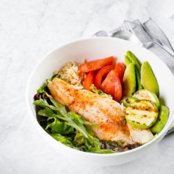 healthy salad fish bowl zander vegetables green leaves avocado tomato