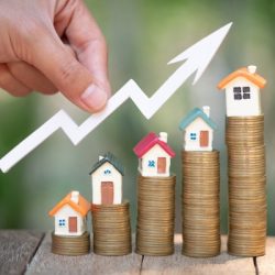 planning savings money of coins to buy a home concept for property