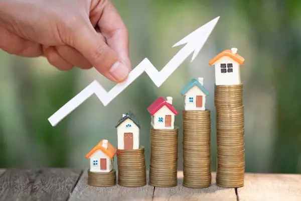 planning savings money of coins to buy a home concept for property