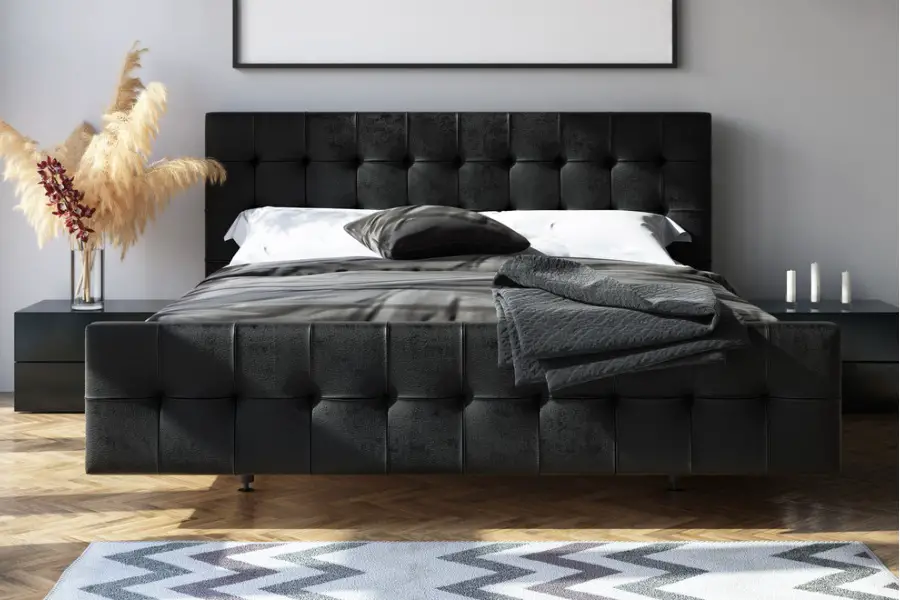 bedroom with black bed